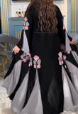 Elegant Dress With Black Floral Embellishment